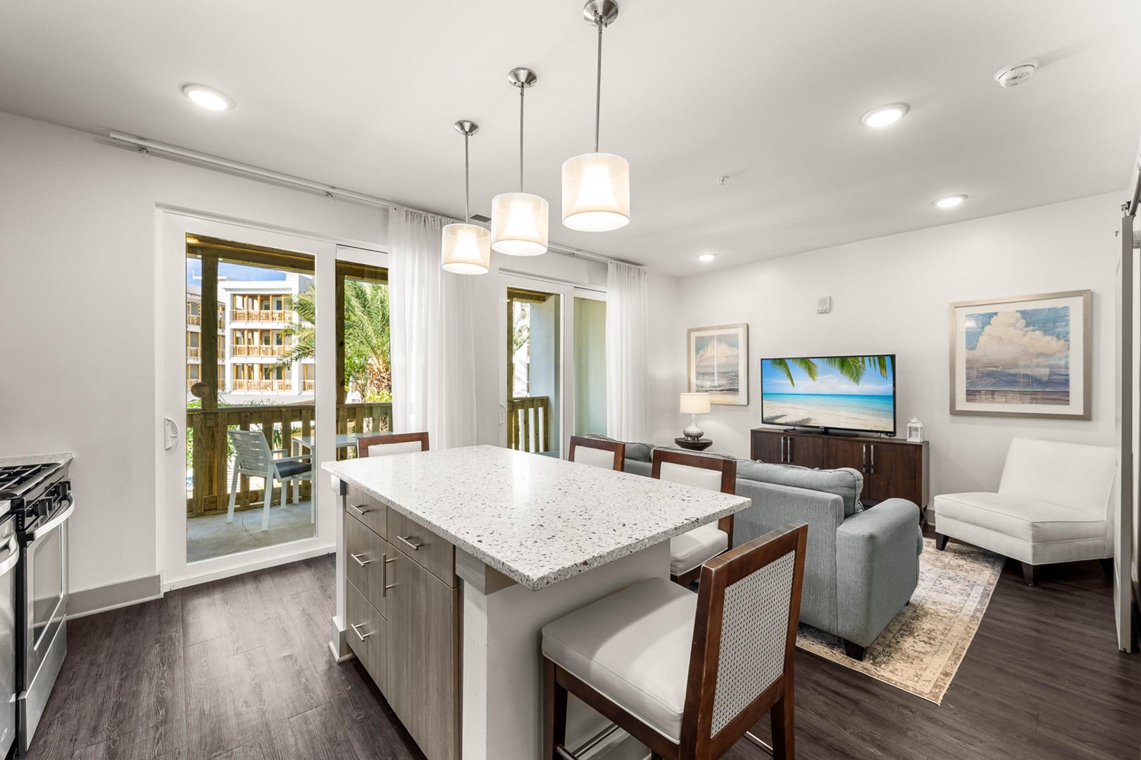 Kitchen and Living Area with Balcony Access
